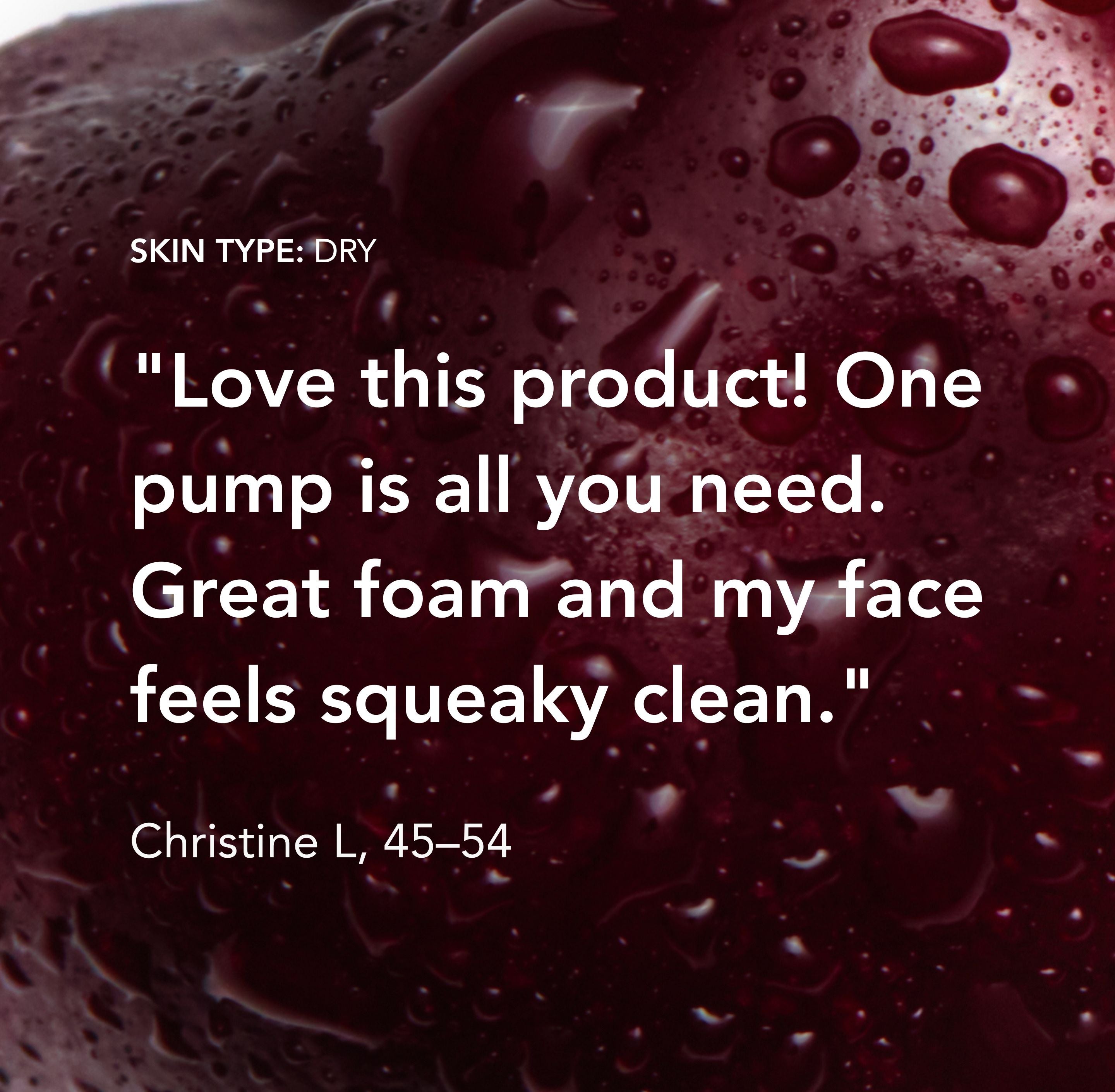 Product review text on a close-up of a foamy texture with water droplets.