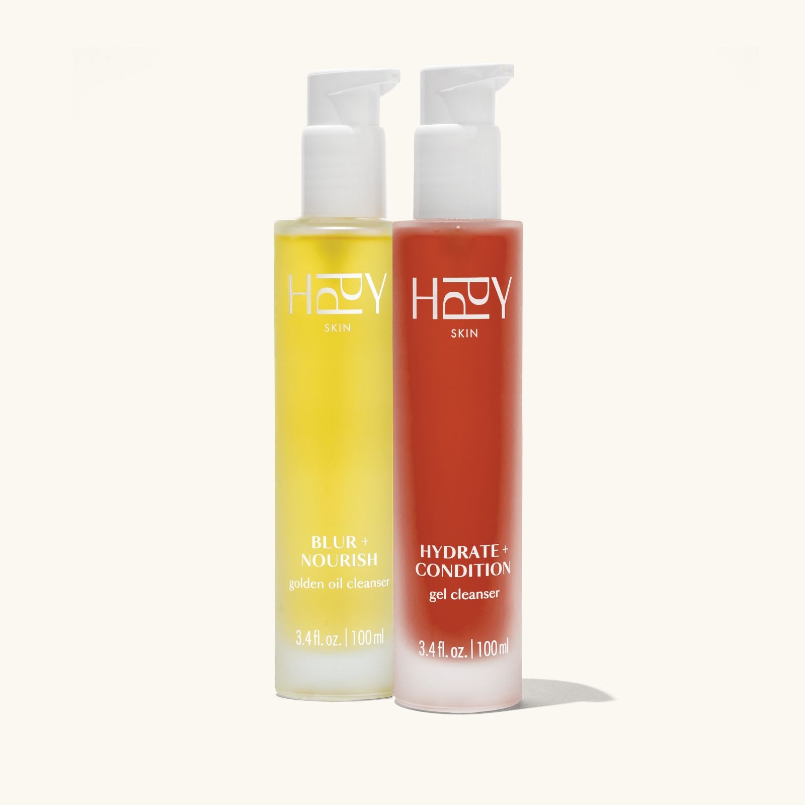 Two bottles of hppy Skin products on a white background