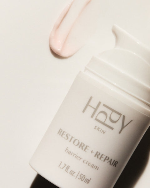 HPPY Skin Restore + Repair barrier cream on a light background