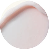 Close-up of a smooth, light pink surface