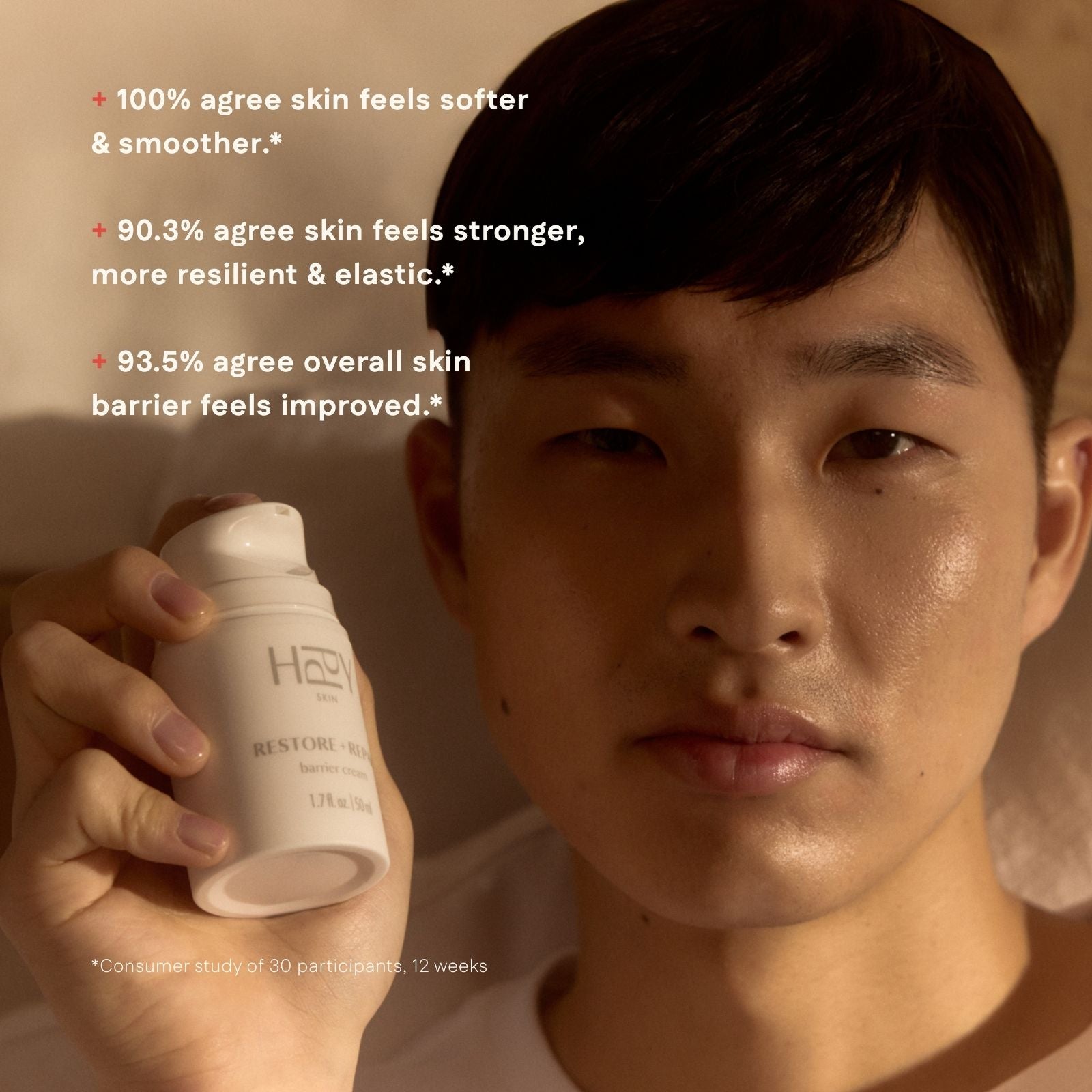 Person holding a skincare product with text about skin improvement on a warm-toned background
