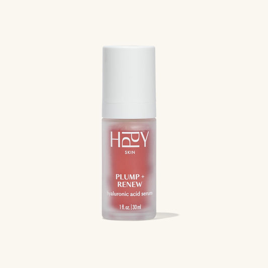 Skincare serum bottle labeled 'HPPY' on a white background