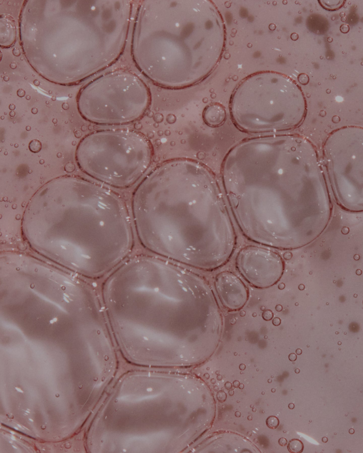 Close-up of cellular structure with a pinkish hue
